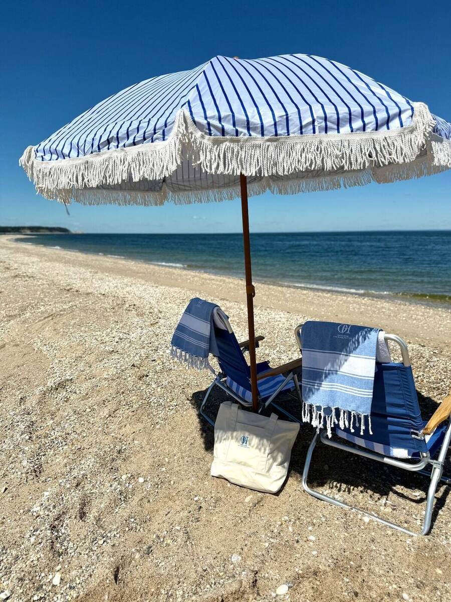 Private beach setup with lounge chairs at Ocean House — exclusive beachfront villa rental, Long Island Sound NY